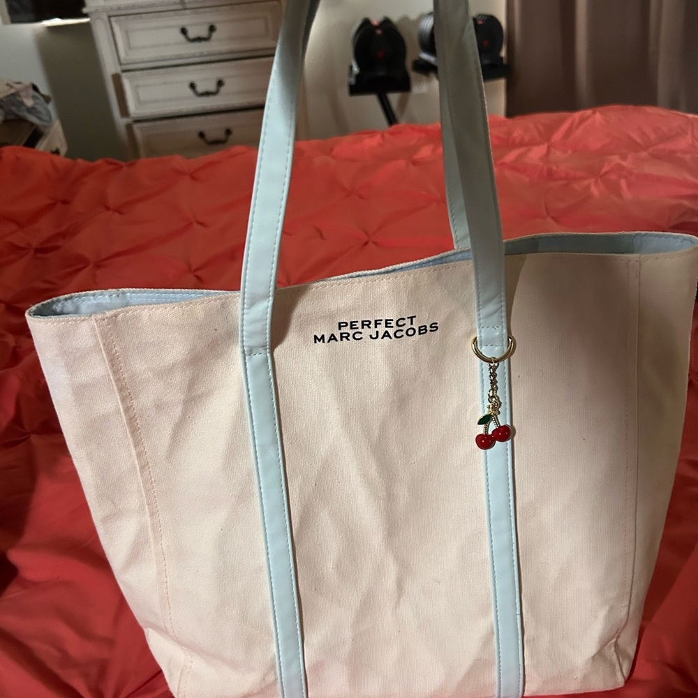 Marc Jacobs Ivory and Sky Blue Tote
With Cherry charms practically brand new